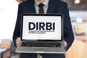 computador com a logomarca oficial da DIRBI